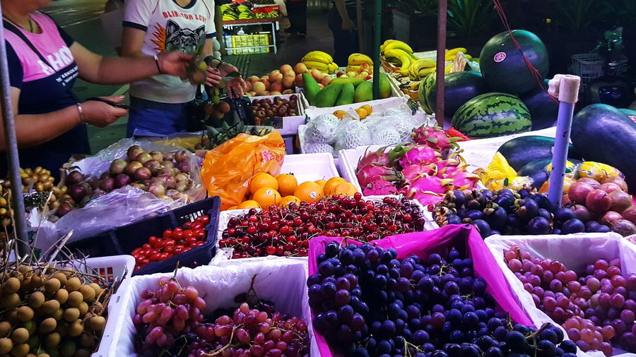 Various fruits for sale at market stall
