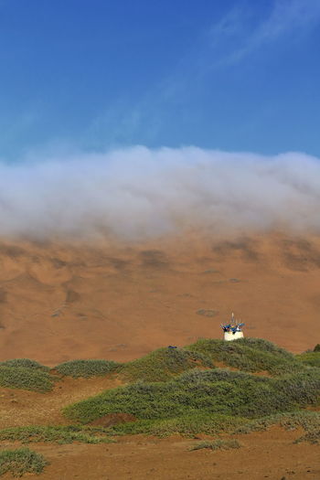 1129 megadune to the w.of sumu jaran lake-clouds rolling over the dune. badain jaran desert-china.