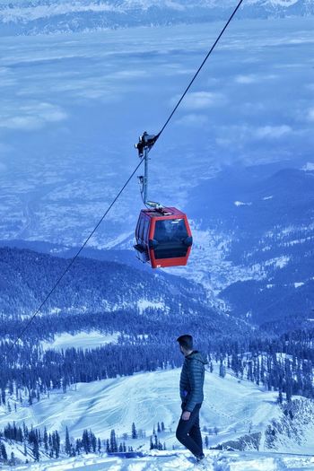 View of ski lift over mountains