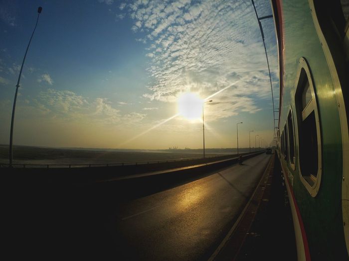 Panoramic view of road against sky during sunset