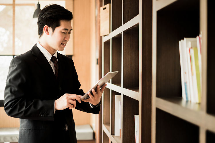 Businessman using digital tablet at office