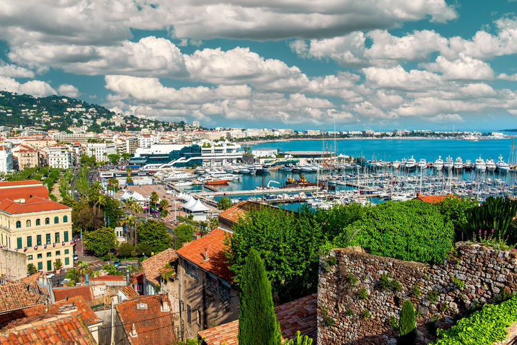 High angle view of le suquet and le vieux port against sky