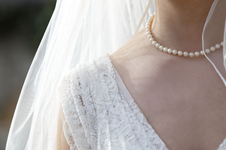 Bride wearing beads 