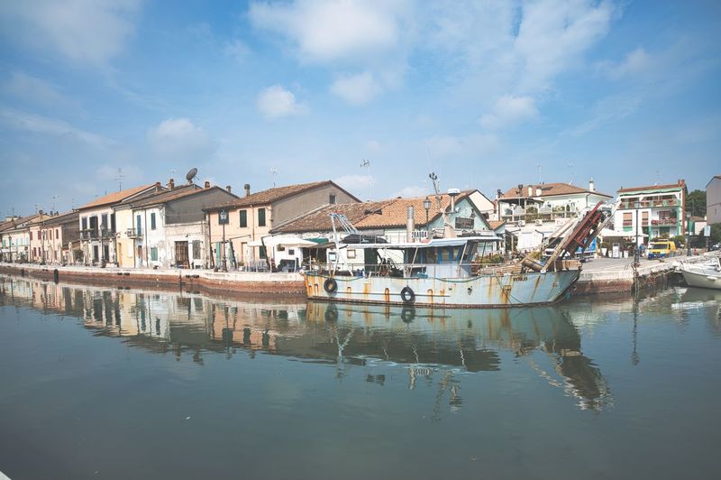 Houses on the canal port of cesenatico in emilia romagna adriatic sea italy