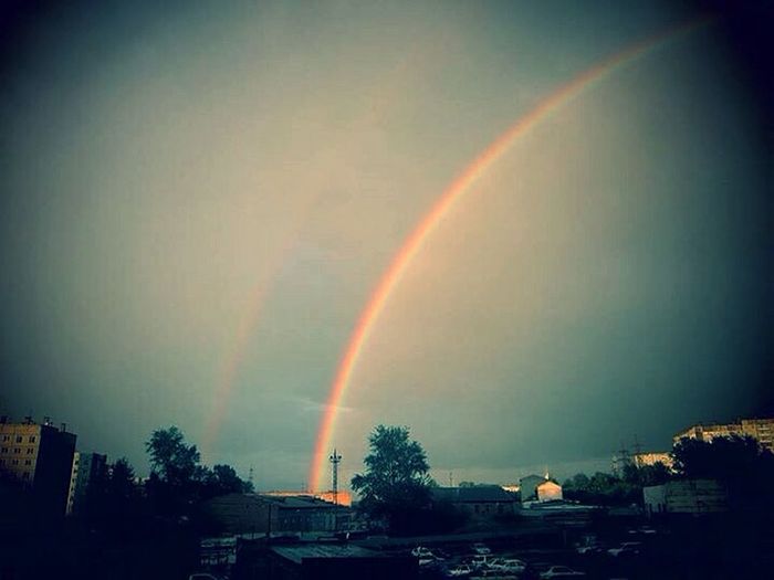 Rainbow over buildings