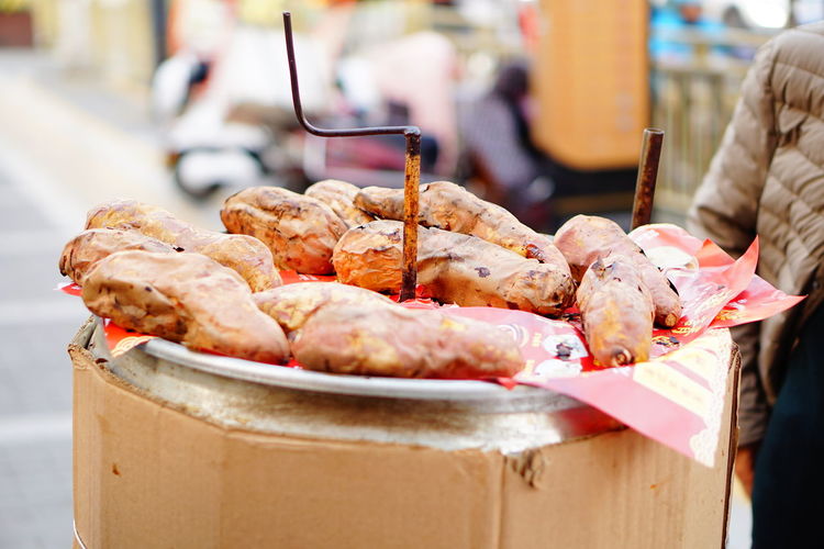 Close-up of sausages on barbecue grill in market