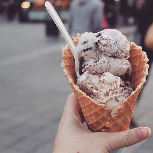 Cropped hand holding ice cream