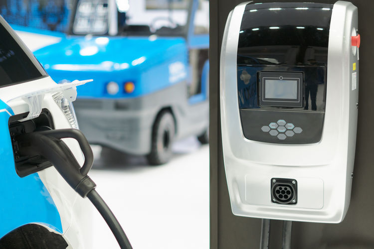 Close-up of car charging at station