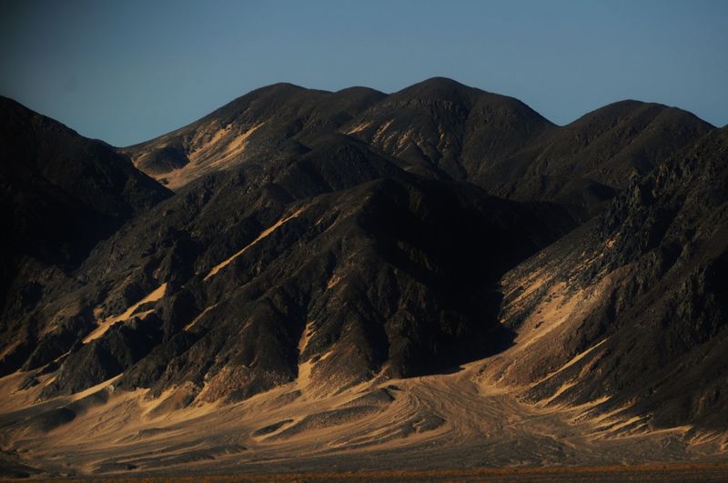 Scenic view of mountains against clear sky