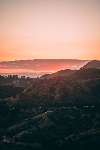 Scenic view of landscape against sky during sunset