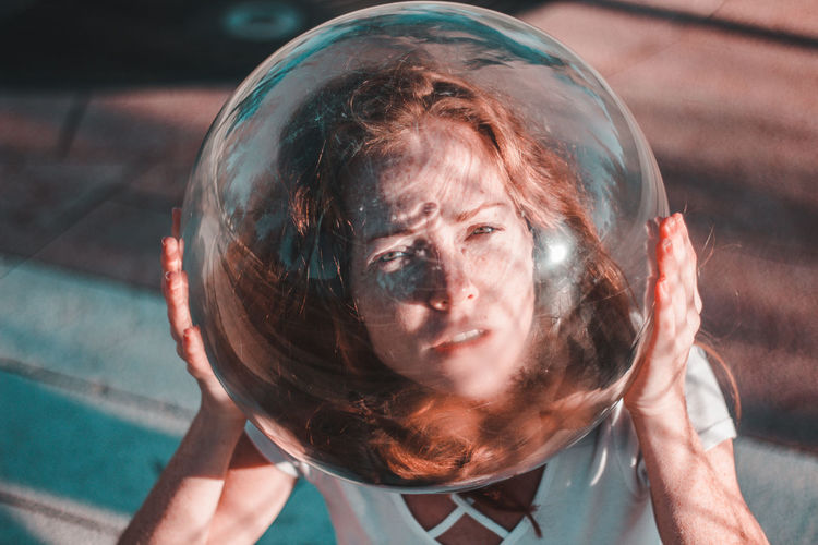 Close-up portrait of a woman with bubbles