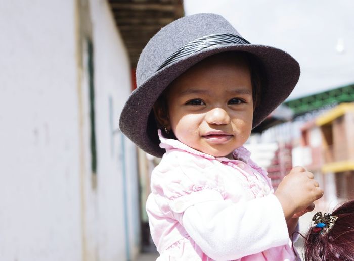Portrait of smiling baby wearing hat