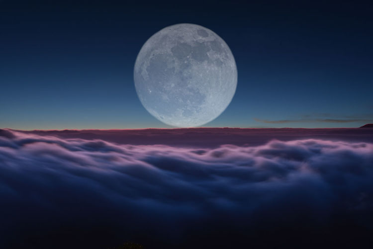 Scenic view of moon against sky at night