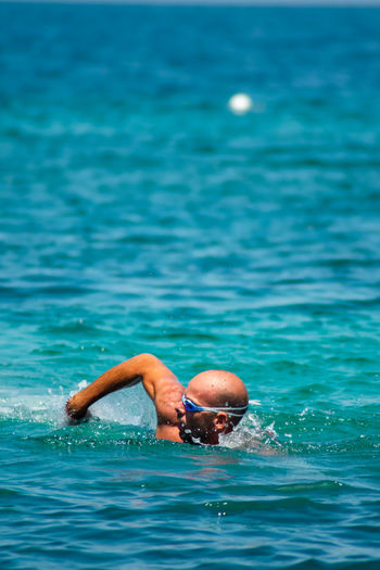 Man swimming on the sea 