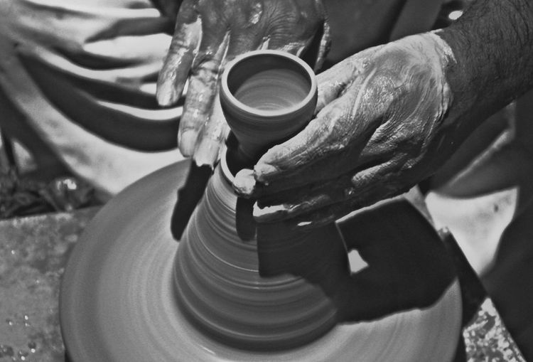 Potter making earthen clay pots