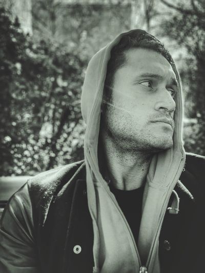 Portrait of young man looking away