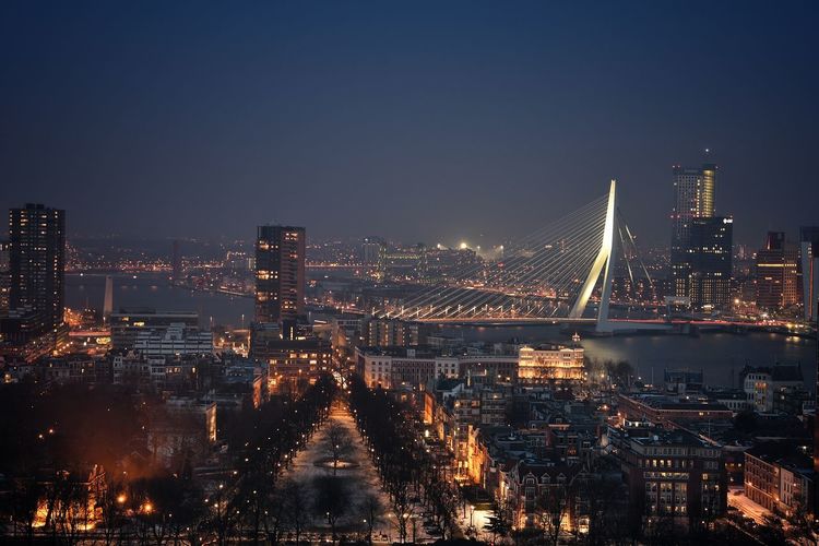 Illuminated buildings in city at night