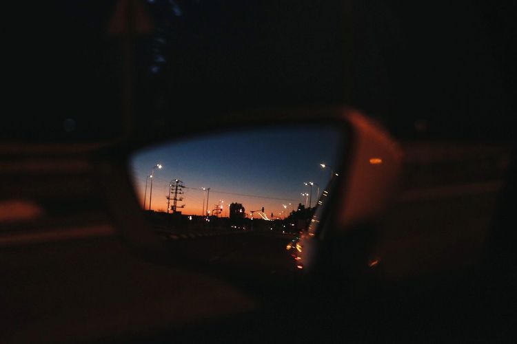 Close-up of car windshield at night