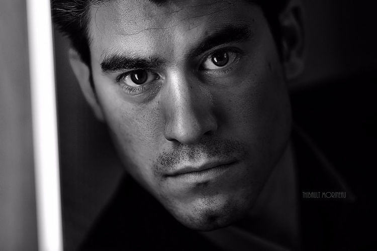 Close-up portrait of serious young man
