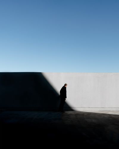 Out of the shadow Real People One Person Clear Sky Lifestyles Shadow Day Blue Outdoors Architecture Men Architecture City The Week On EyeEm TheWeekOnEyeEM Building Exterior Scenics Fresh on Market 2017 EyeEm Ready The Street Photographer - 2018 EyeEm Awards Capture Tomorrow