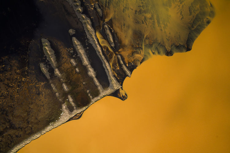 Aerial view of orange river in southern iceland