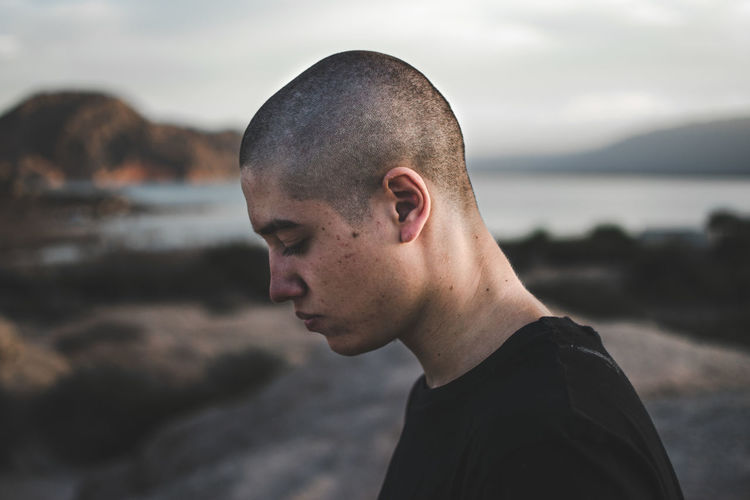 The Week on EyeEm Beach Contemplation Focus On Foreground Headshot Human Face Land Leisure Activity Lifestyles Looking Nature One Person Outdoors Portrait Real People Sea Side View Sky Teenager Water Young Adult Young Men The Portraitist - 2018 EyeEm Awards