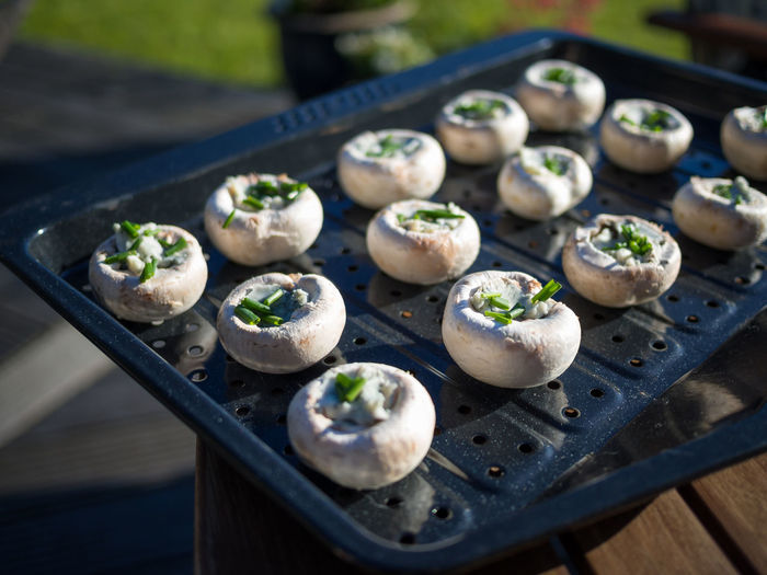 High angle view of stuffed mushrooms on table
