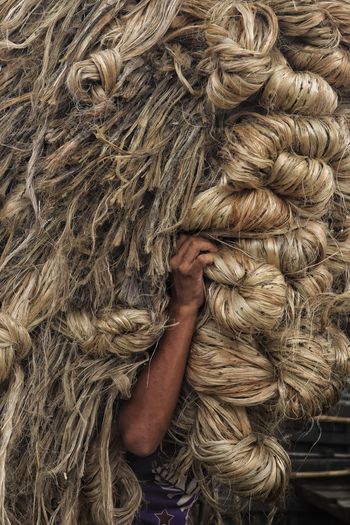 Eye angle view of carrying jute on head