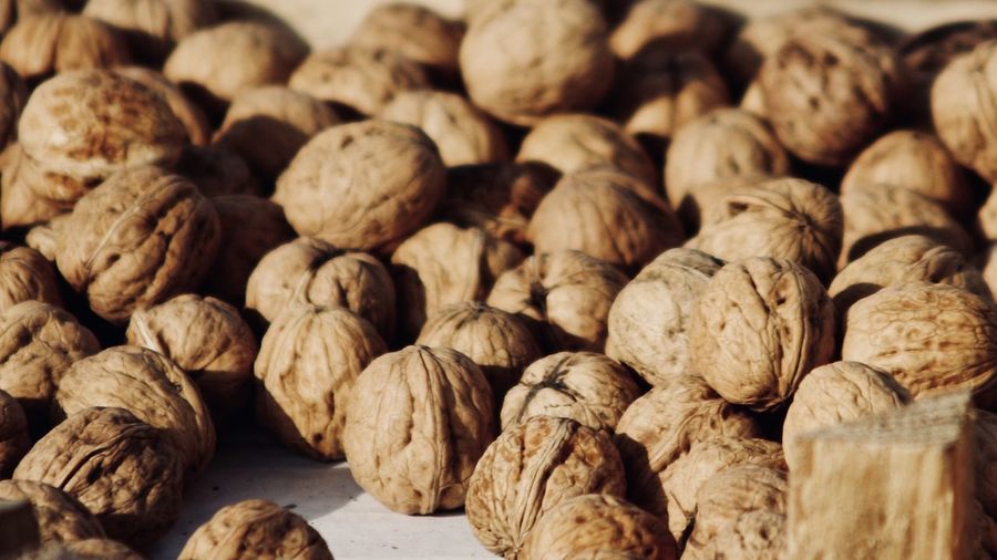 Full frame shot of walnuts on table