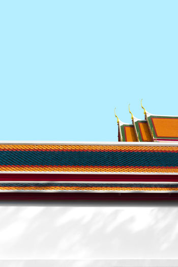 Low angle view of ship against blue sky
