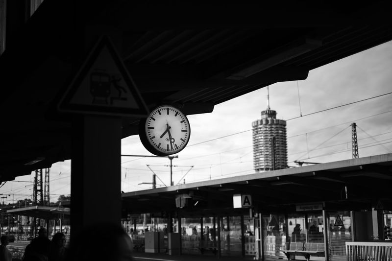 Low angle view of clock at railroad station in city