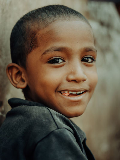 Close-up portrait of smiling kid