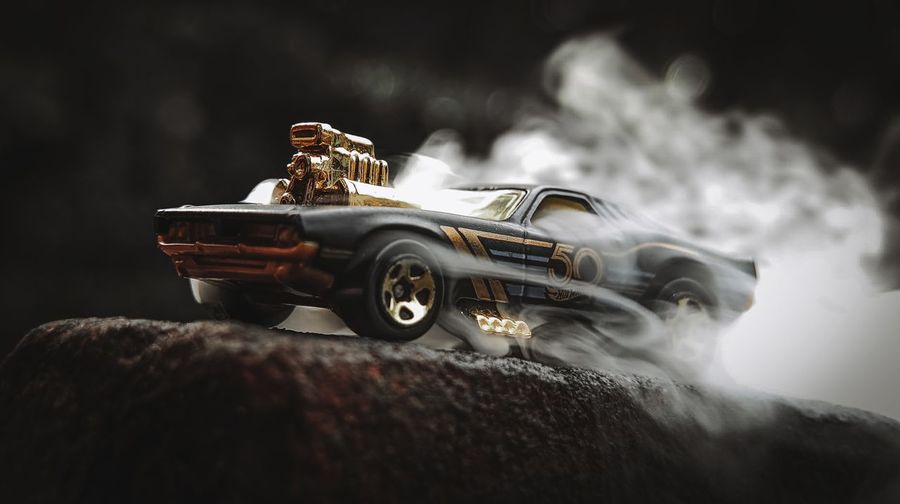 Car miniature with smoke
