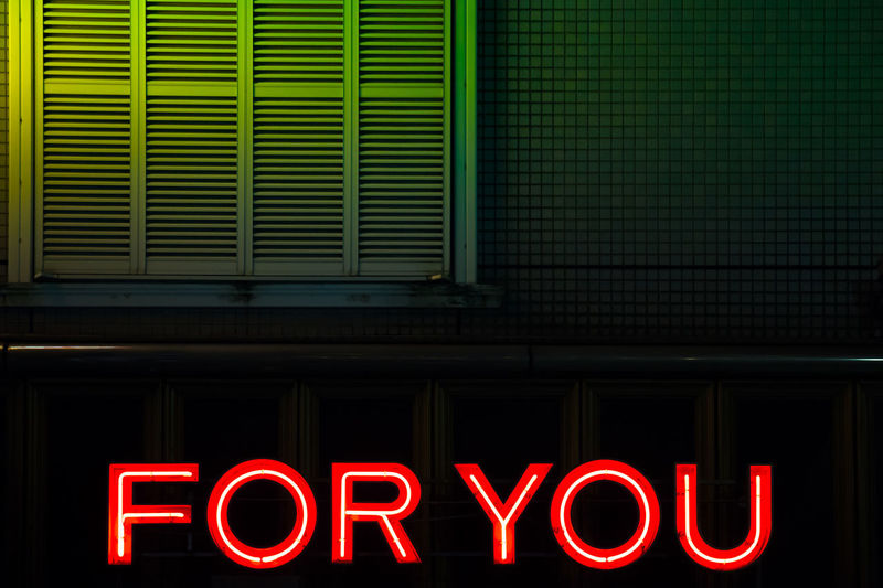 Illuminated text in city