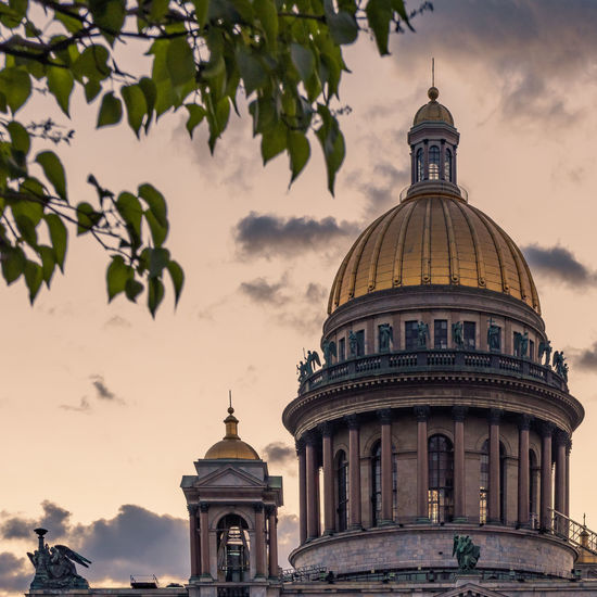 Low angle view of building against sky during sunset