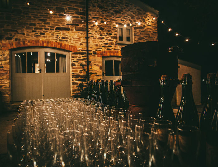 Close-up of empty wineglasses arranged on table