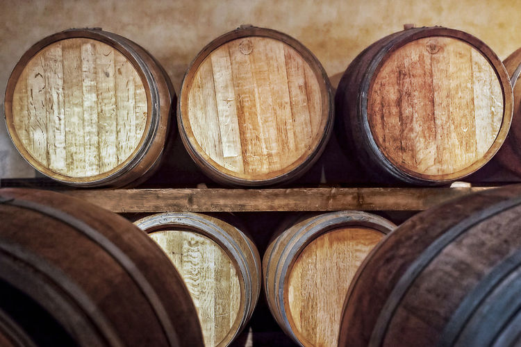 Barrels on shelf in factory