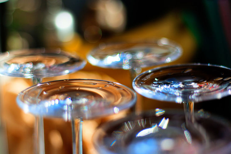 Close-up of upside down wineglasses