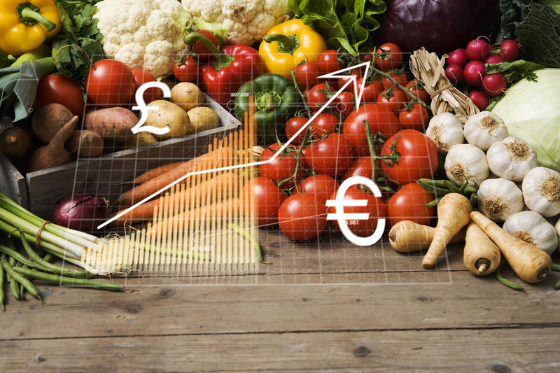 Financial chart and heap of vegetables