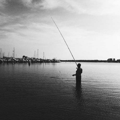 Man fishing in water