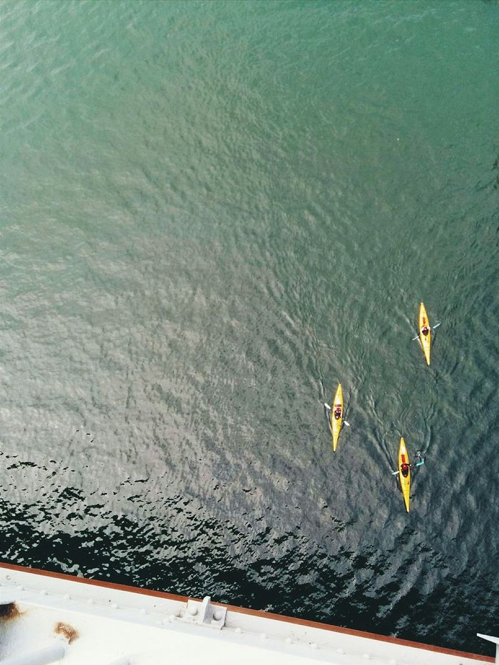 High angle view of canoes in calm water