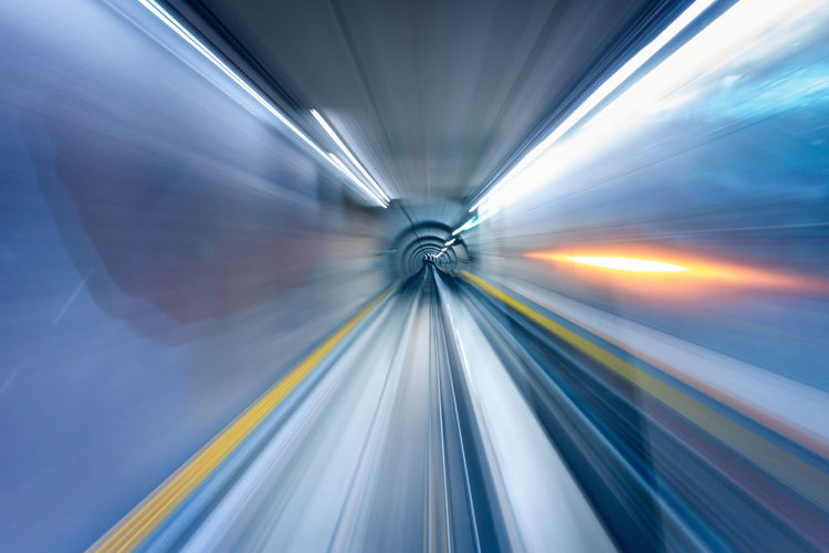 Blurred motion of illuminated tunnel