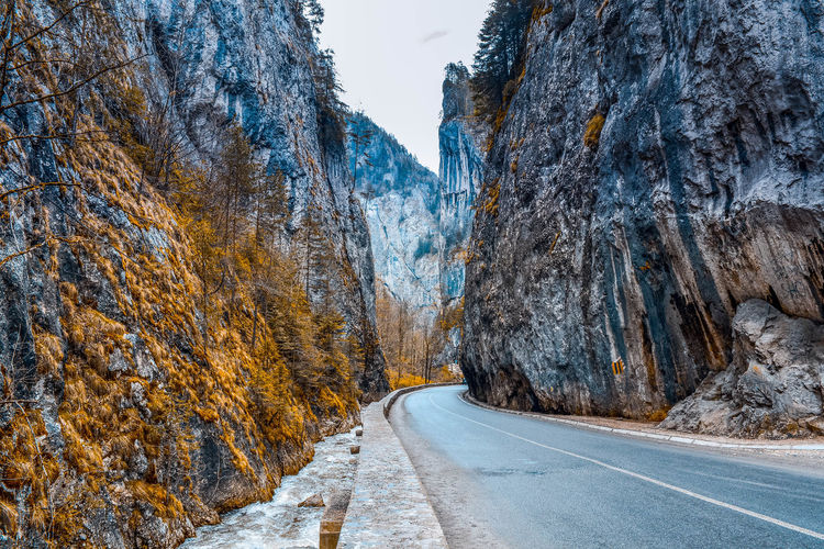 Road amidst rocky mountains
