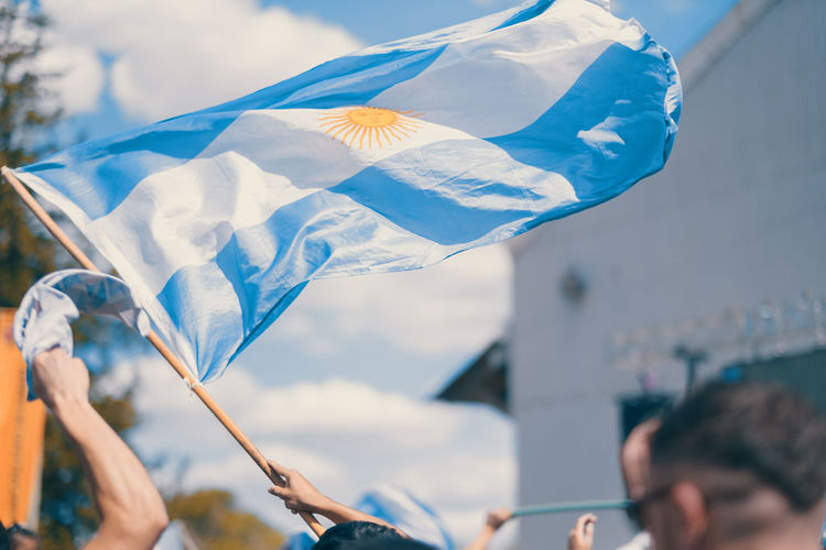 Argentinian flag and people celebrating