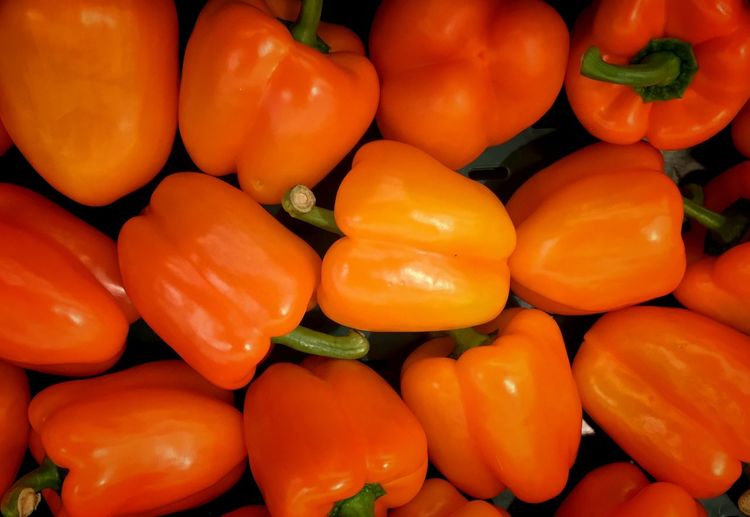 Full frame shot of orange bell peppers
