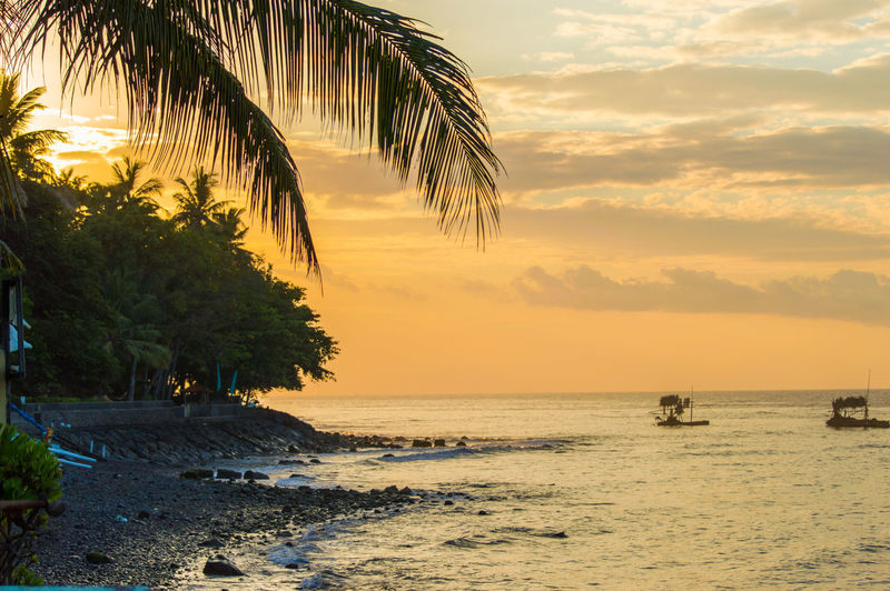 Scenic view of sea against sky during sunset