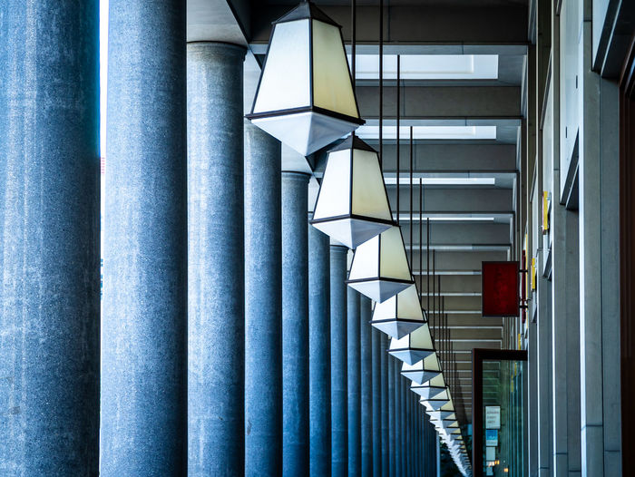 Low angle view of lamps in building
