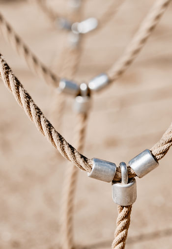 Close-up of ropes tied on rope