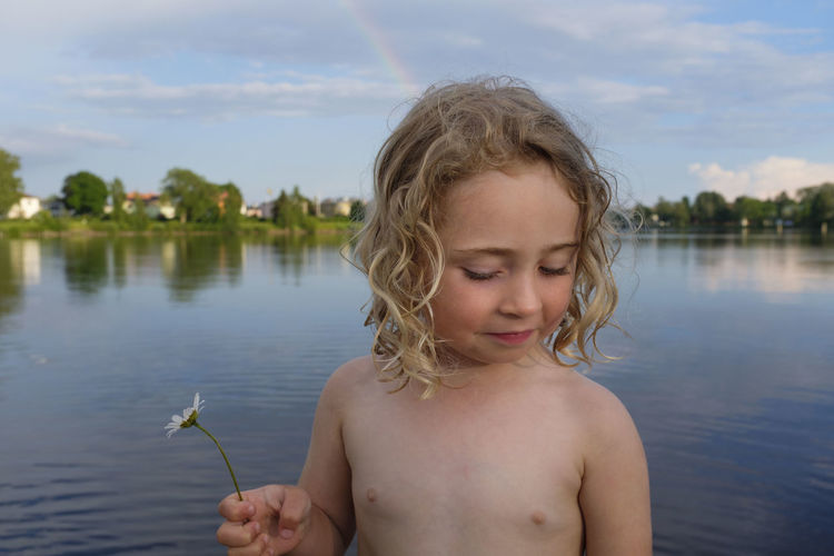 Portrait of cute girl in lake