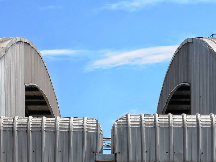 Low angle view of modern building against sky